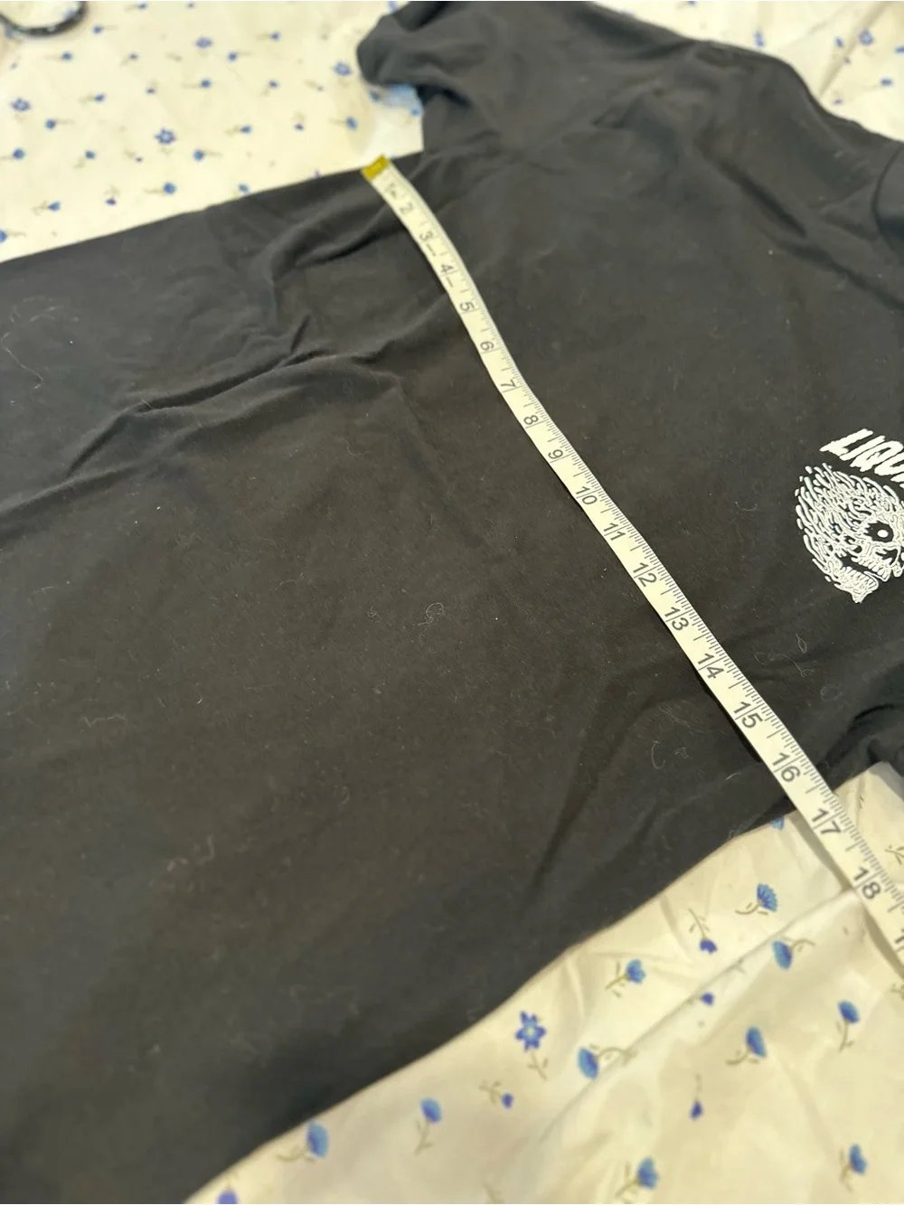 Liquid Death Sz:M Instant Death black/ white Melting Flaming Skull graphic Tee.
